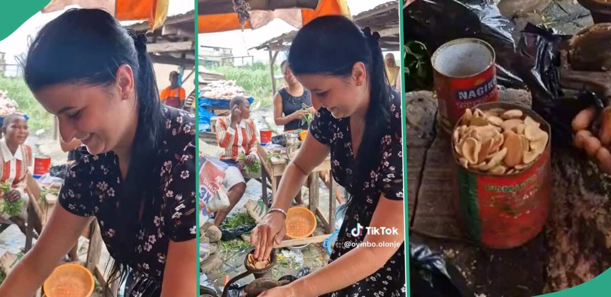 “You Tried”: White Woman Spotted Grinding Ogbono Soup Inside Nigerian Market, Video Causes Buzz